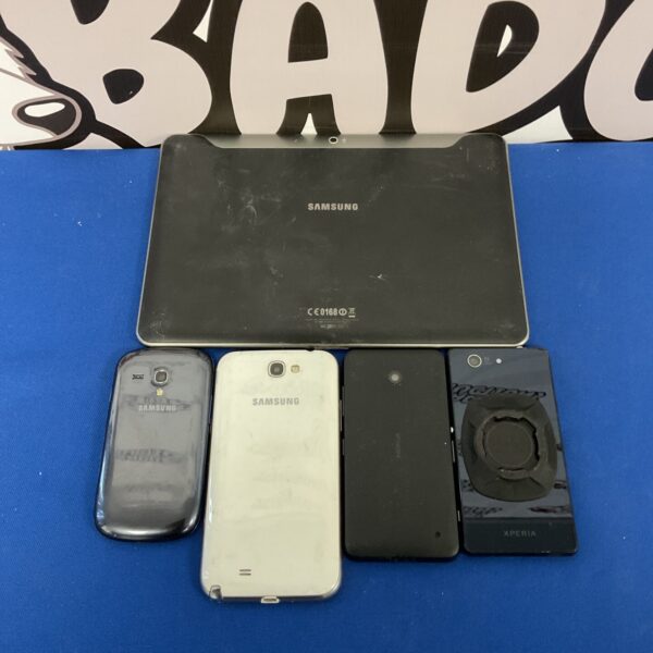 Bundle of used phones and a tablet including Samsung device.