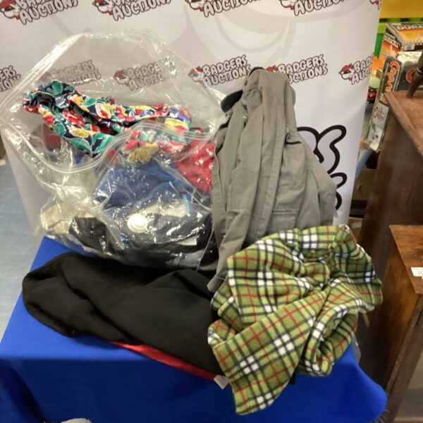 Mixed clothing lot with assorted apparel and tags.