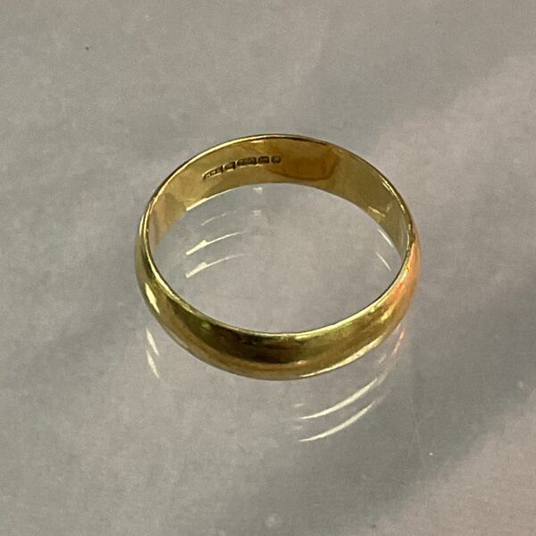 Classic 18ct gold band ring, simple and elegant design.