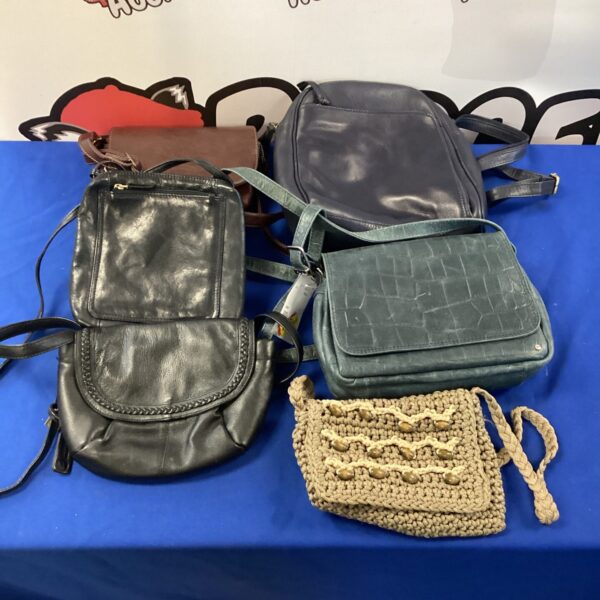 Vintage leather handbags collection, retro purses and shoulder bags.