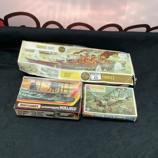 Vintage Airfix model kits of the Bismarck and Tirpitz, collectible plastic models.