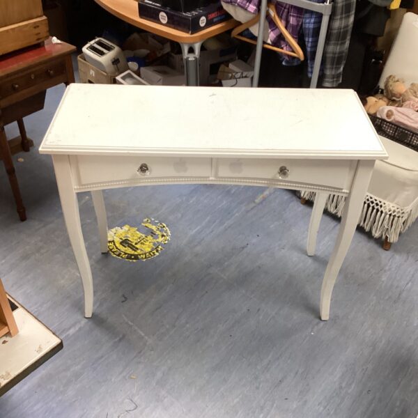 White side table with two drawers, vintage style.