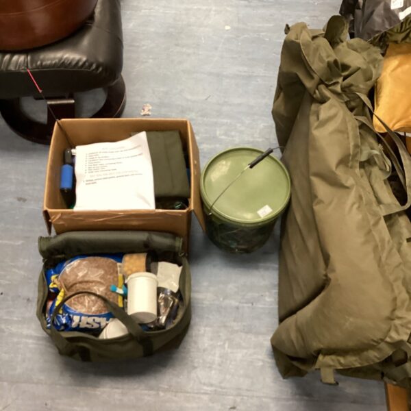 Fishing tackle lot with tackle box and unhooking mat.