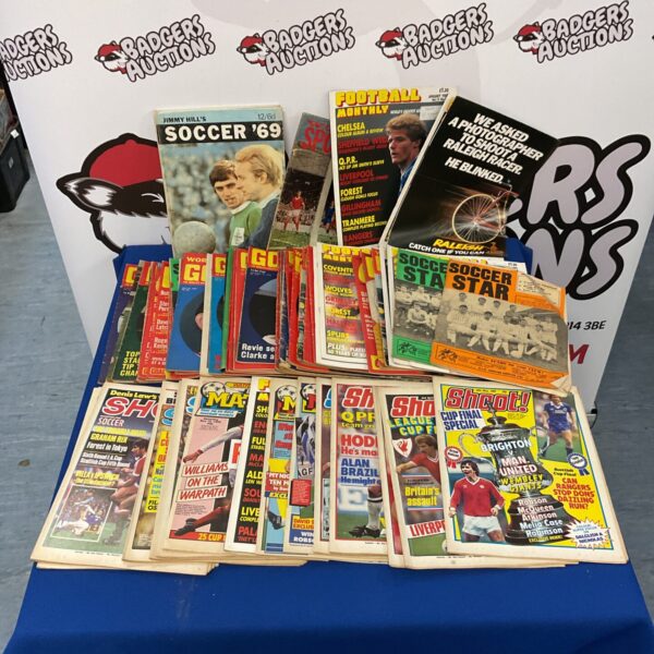 Vintage football magazines, including Shoot and Soccer Star, in a collection.
