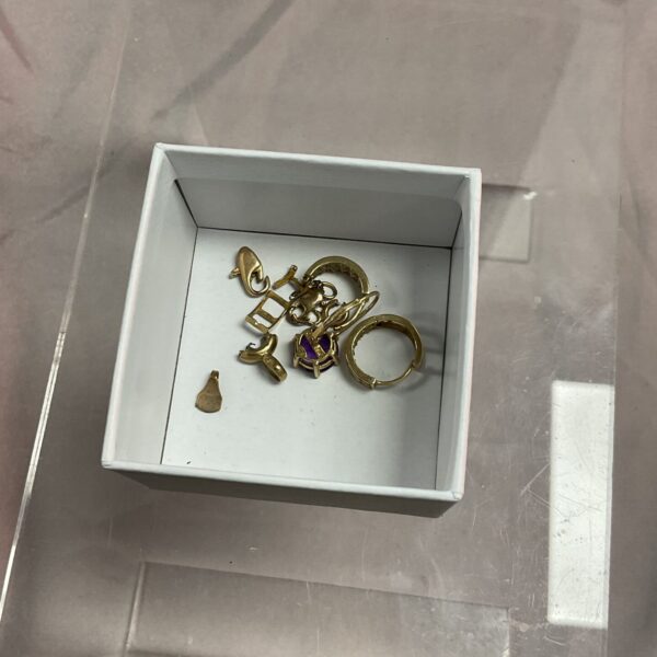 Close-up of a scrap gold jewellery lot for refining.