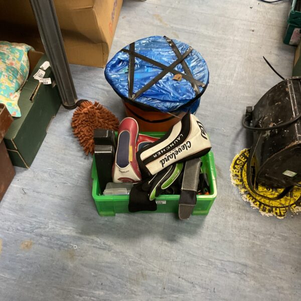 Golf club covers and bucket of used golf balls lot for sale.