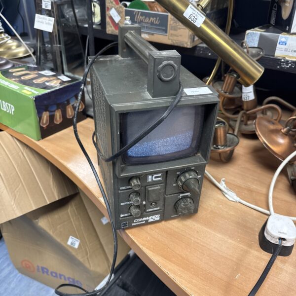 Vintage National Commando 505 portable television in used condition.