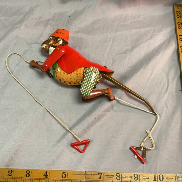 Tinplate rope climbing monkey