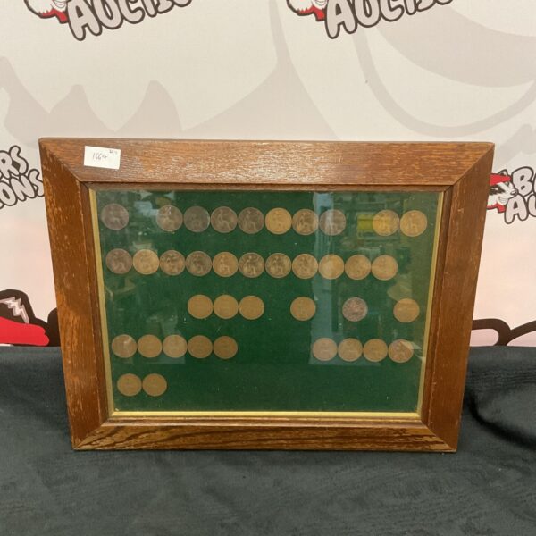 Framed vintage penny collection from 1900 to 1949.