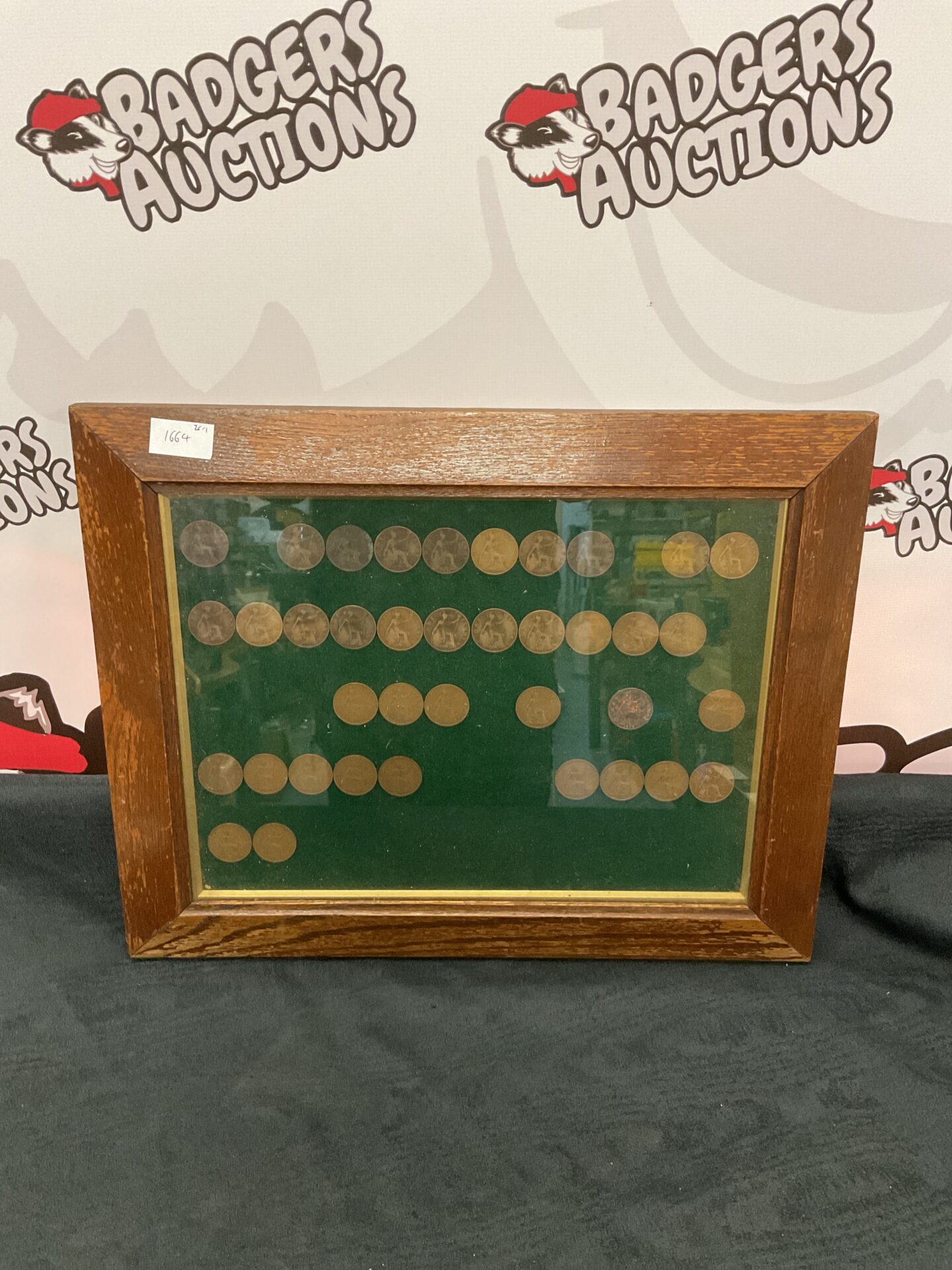 729 Collection of framed pennies dated 1900 to 1949