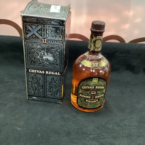 Chivas Regal 12 Year Old Whisky bottle with label intact.