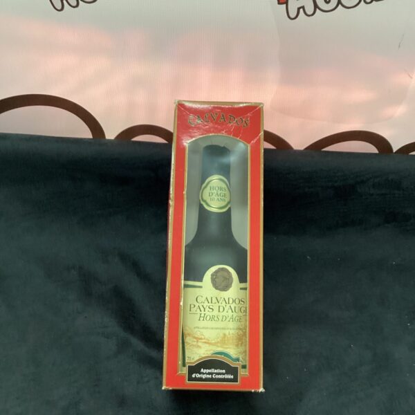 Vintage bottle of Calvados Hors D’Age French apple brandy.