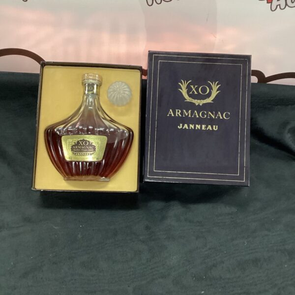 Bottle of Janneau XO Armagnac in its original presentation case.
