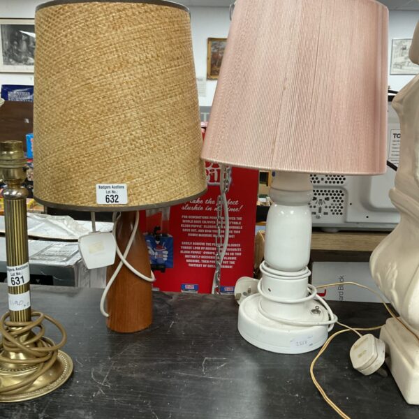 Pair of vintage table lamps with wooden bases and woven shades.