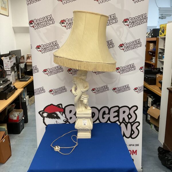 Vintage cherub table lamp with wheat sheaf design, a collectible home decor piece.