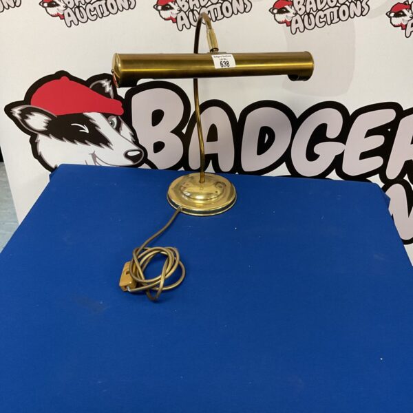 Vintage brass bankers lamp with adjustable shade.