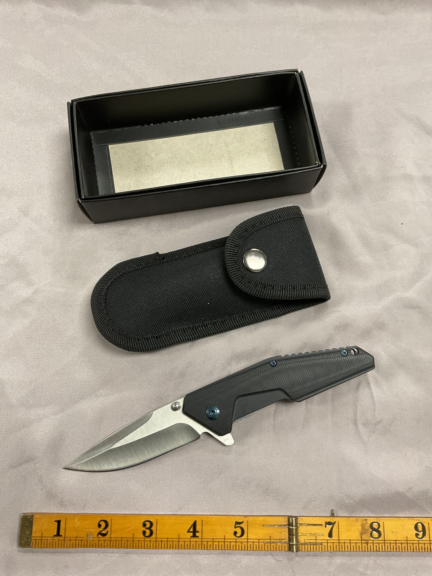 787 D2 Pocket lock knife with ribbed grip and case