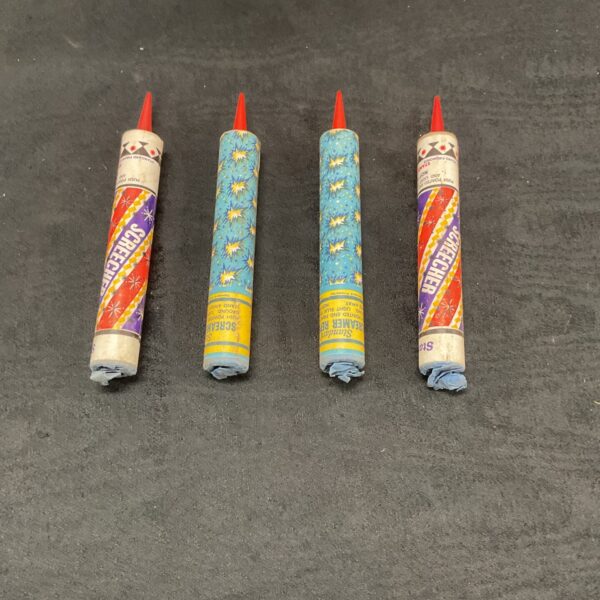 Vintage screamer firework label with colourful design.