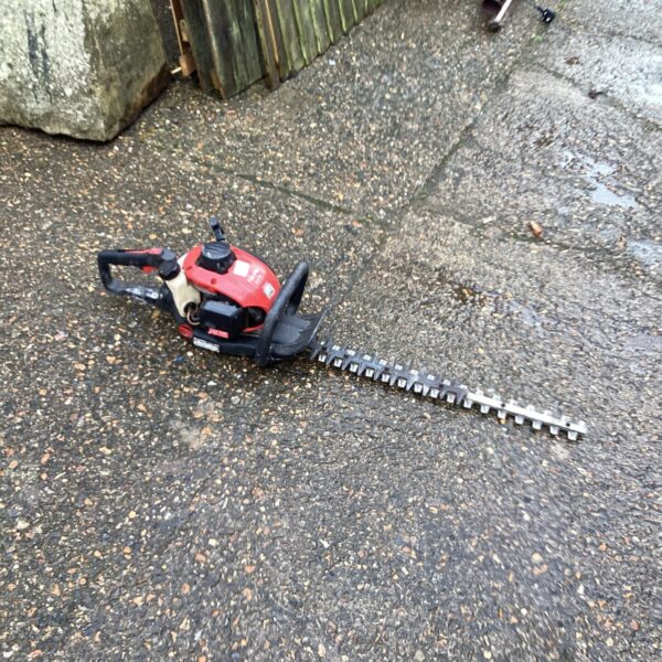 Used Mountfield petrol hedge cutter for garden maintenance.