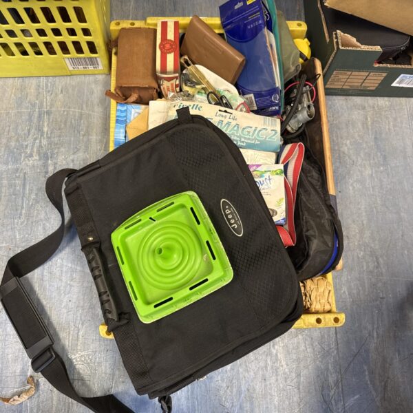 Front view of a Jeep canvas satchel bag with adjustable strap.