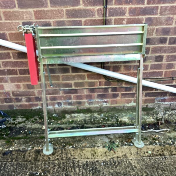 Steel chainsaw log bench for timber milling and firewood processing.