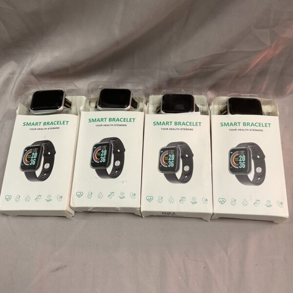 Lot of four smart health bracelets for fitness tracking.