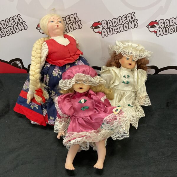 Vintage collector doll in traditional folk costume with braids.
