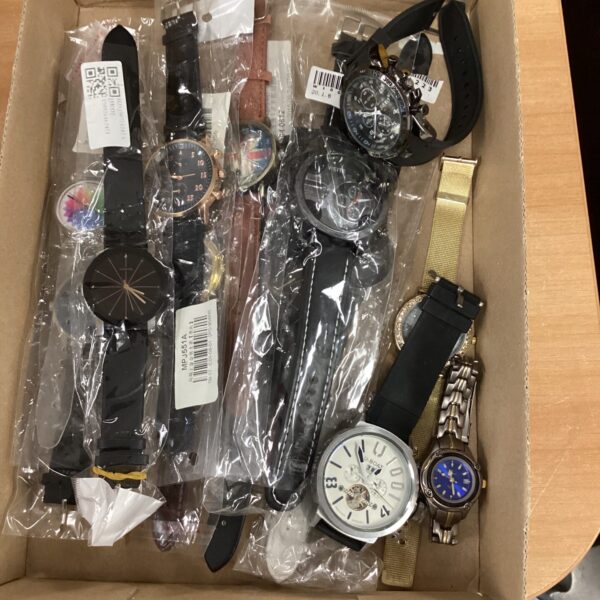 Tray of assorted wristwatches for collectors and repair projects.