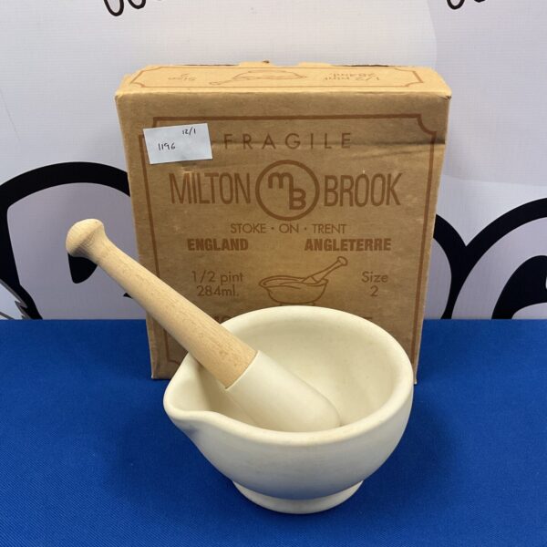Vintage Milton Brook mortar and pestle for grinding spices.