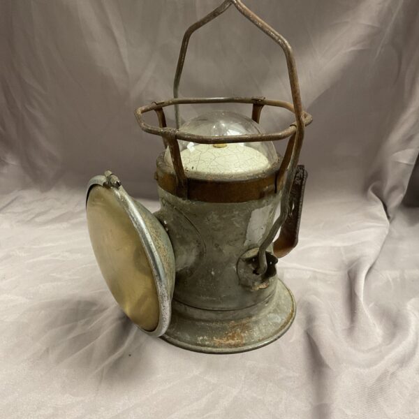 Vintage Siemens Delta railway lantern with clear glass lens.