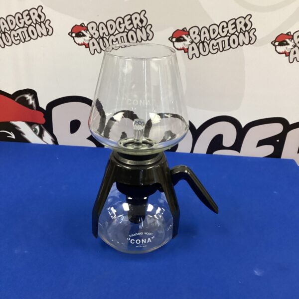 Vintage Cona coffee maker, a classic mid-century modern design.