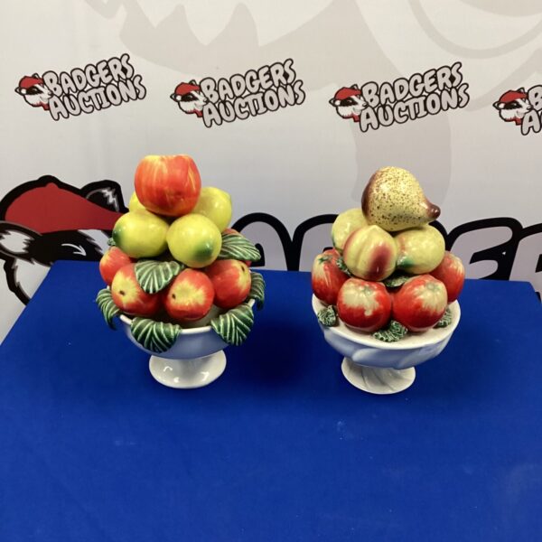 Vintage ceramic fruit bowls with artificial fruit display.