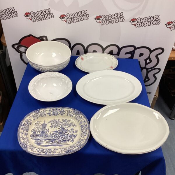 Antique meat plates collection featuring blue and white transferware designs.
