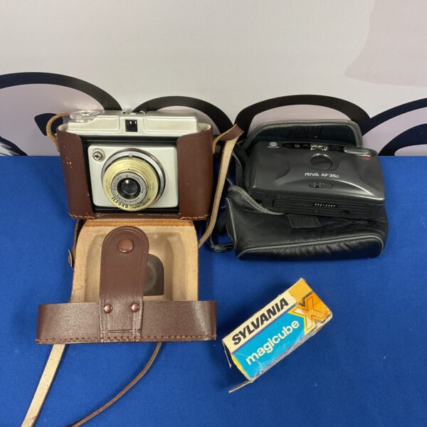 Vintage Ilford Super Sporti and Minolta Riva AF35C film cameras.