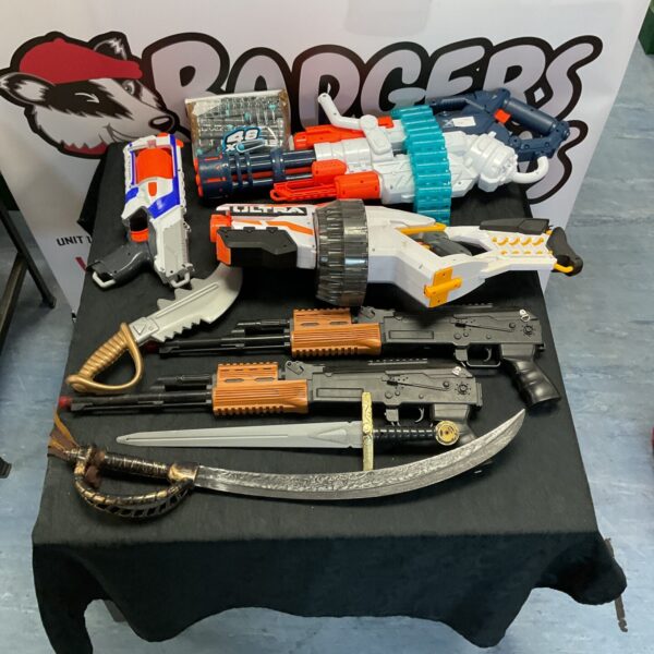 Assorted Nerf guns and toy weapons in a collection lot.