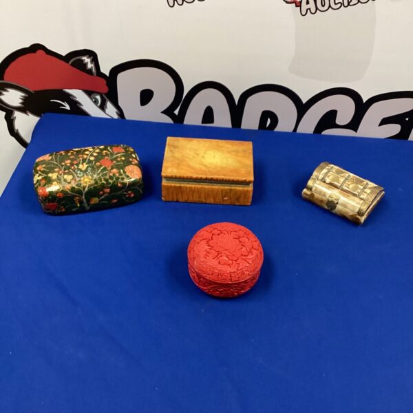 Lot of four vintage decorative jewellery boxes for storage.
