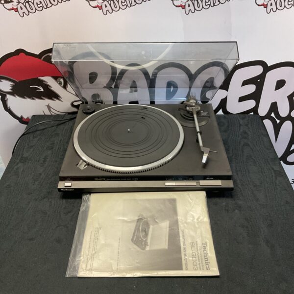 Vintage Technics SL-QD33 direct drive turntable, front view.
