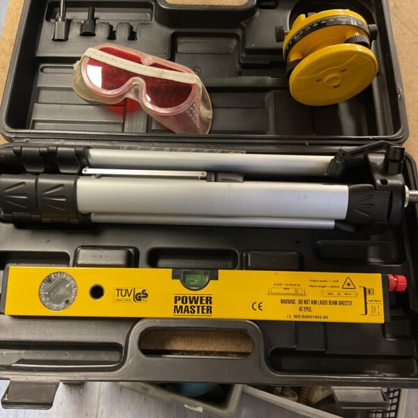 Red beam Power Master laser level set in carrying case.