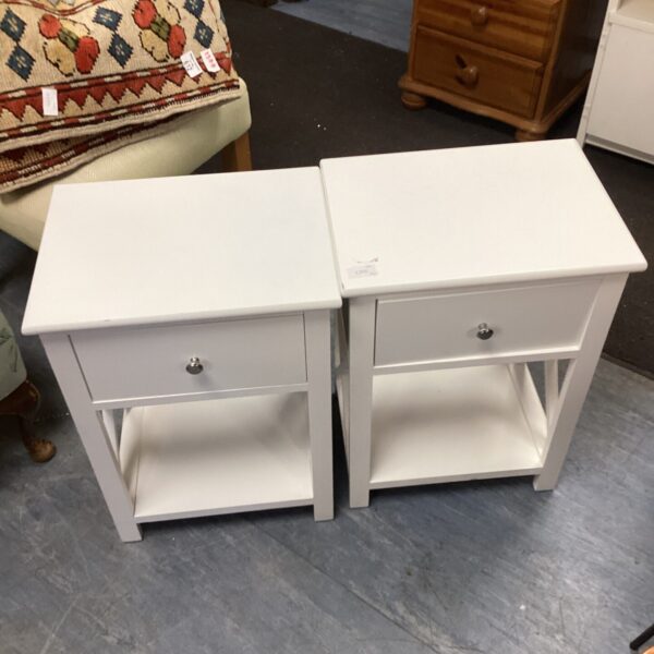 Pair of white bedside cabinets with a single drawer.