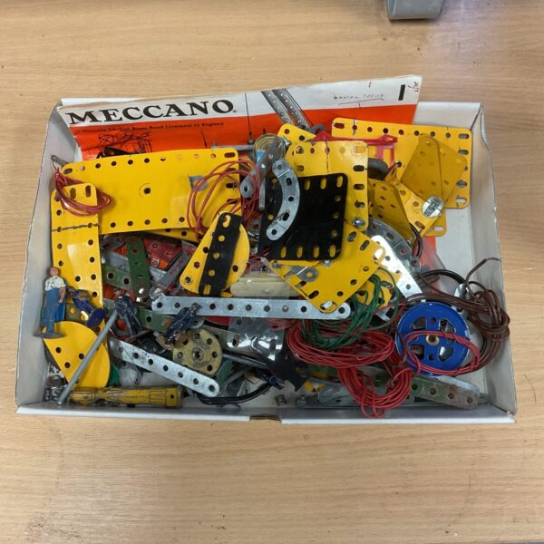 Tray of vintage Meccano parts for construction and collecting.