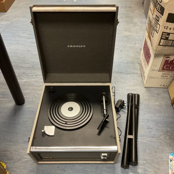 Vintage Crosley record player with wooden cabinet, retro style turntable.