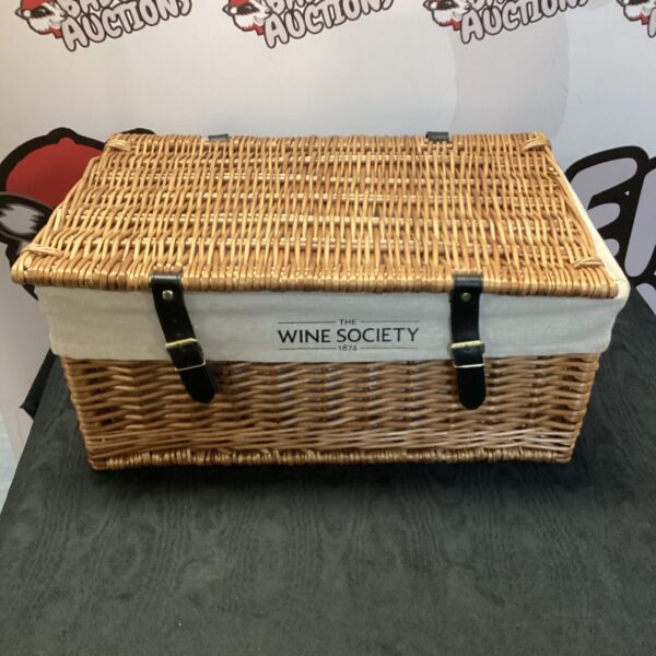 Vintage Wine Society wicker basket with clasp closure.
