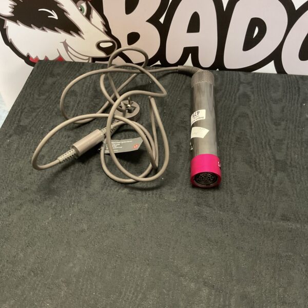 Front view of a used Dyson Airwrap Complete Styler hair styling tool.