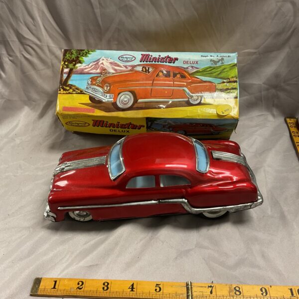 Vintage tinplate Minister Delux toy car in original box.
