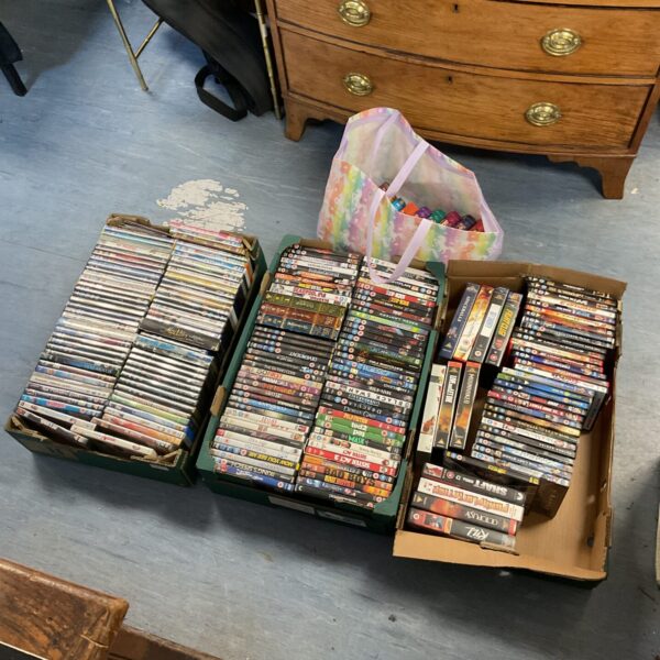 Large lot of DVDs and VHS cassettes for collectors.
