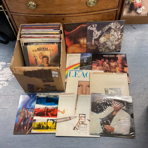 Vintage vinyl record collection featuring Kate Bush and The Police.