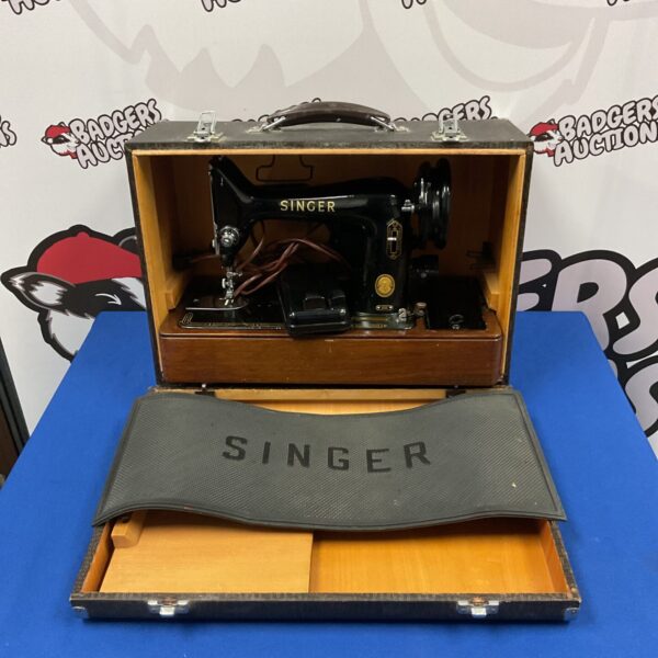 Vintage Singer 99k electric sewing machine in good condition.