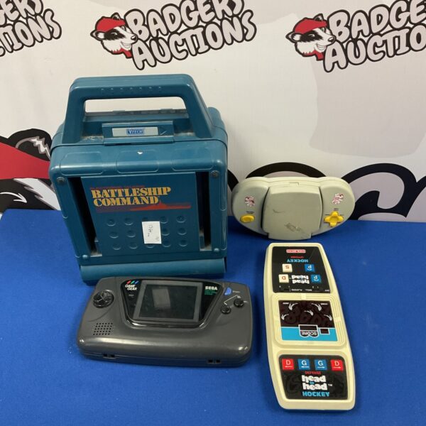 Retro video game lot featuring Sega Game Gear and Coleco Head 2 Head Hockey.