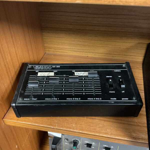 Vintage Vivanco MX 300 audio mixer with gain controls.