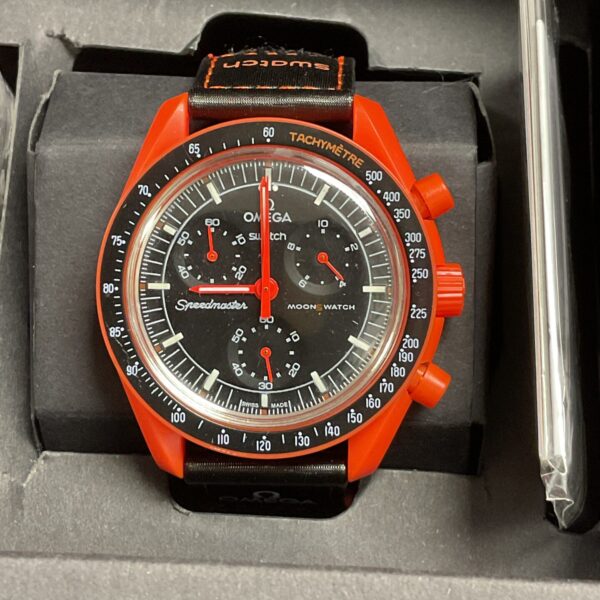 Front view of the orange and black Omega Swatch Moonwatch Lava.